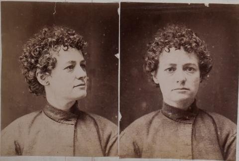 black and white portrait photos of Martha Needle, short curly hair and dark eyes