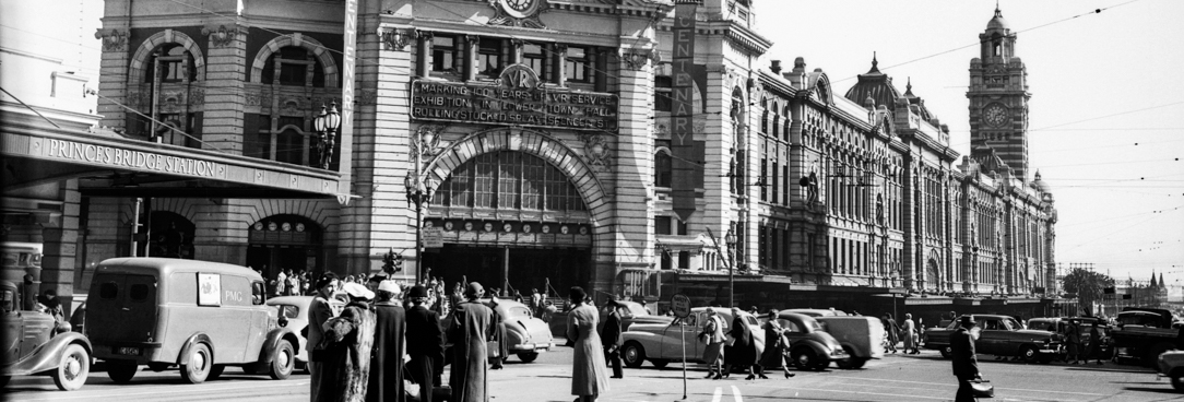 A black and white photo of Flinders Street Station in 1954
