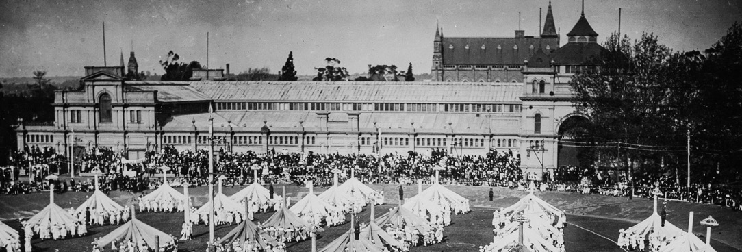 Black and white photo of maypole dancing