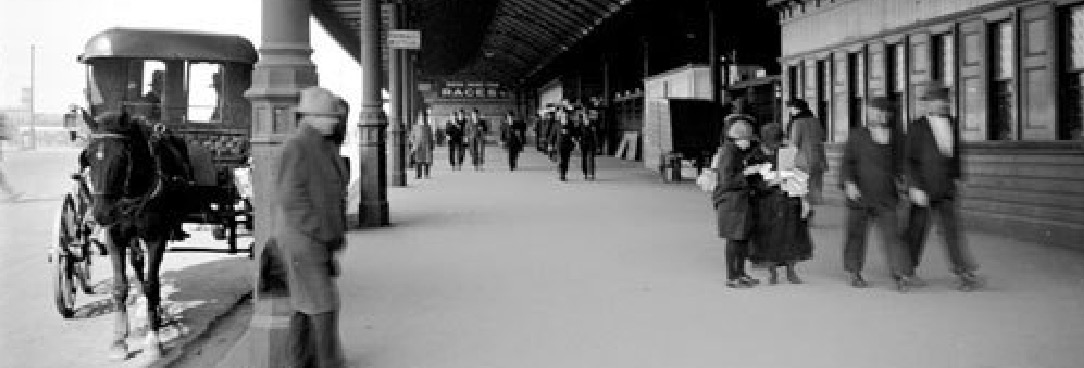 Black and white photo of Flinders st Station with Horse and Cab