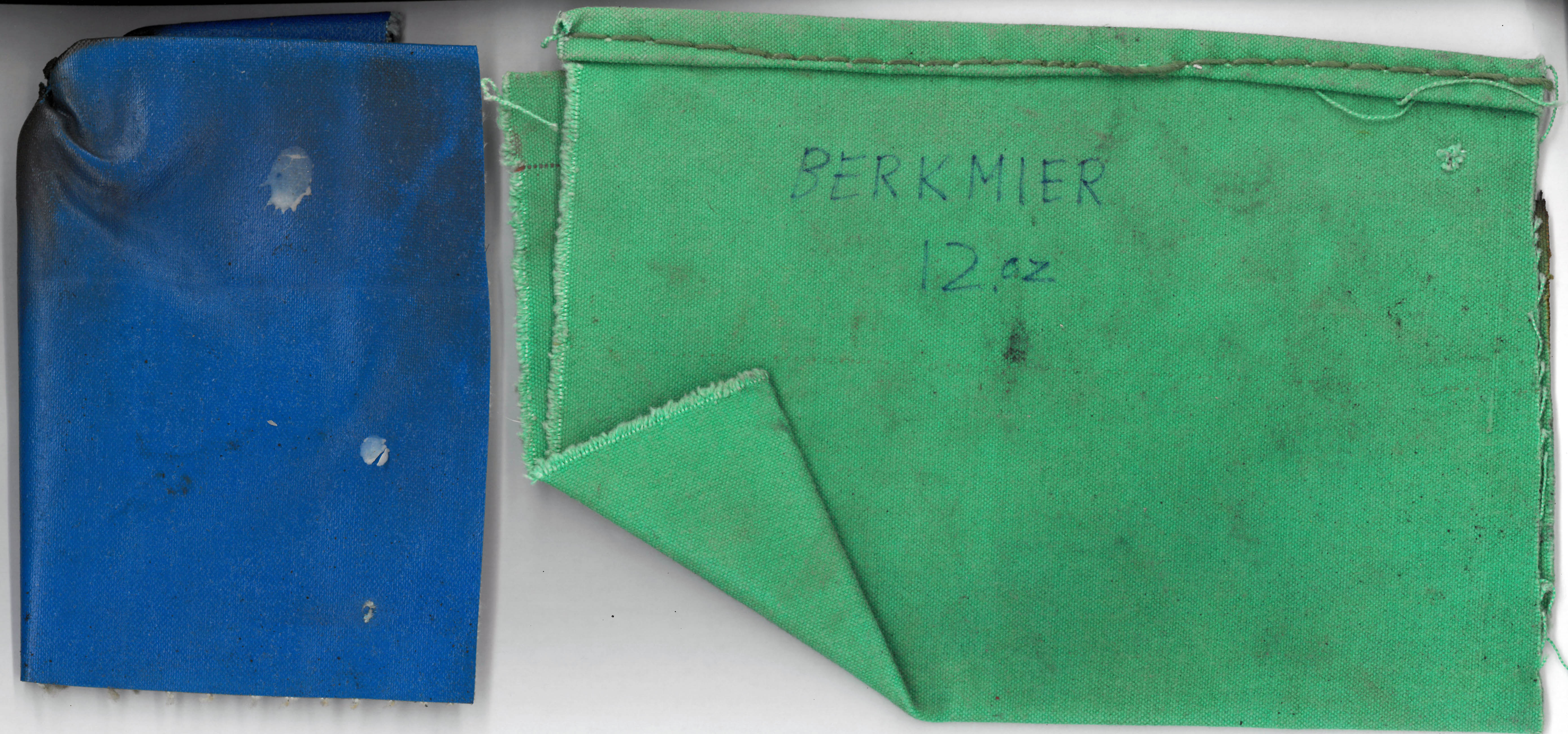 swatches of fabric, blue and green with the word berkmier on the green one
