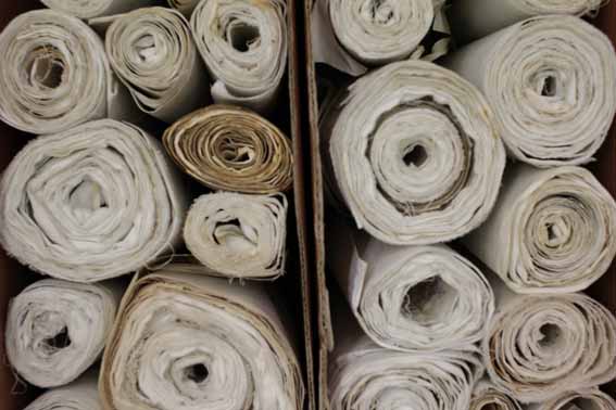 photo of multiple reels of paper