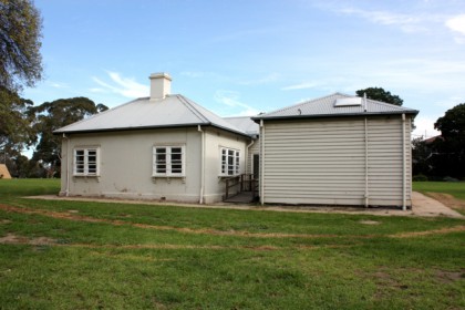 Front (eastern) face of the caretaker’s cottage complex in 2013.