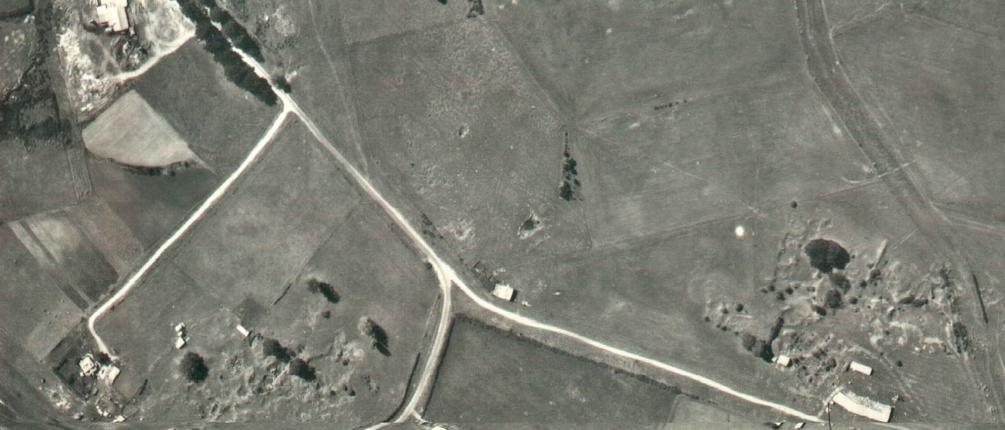 Image of portion of 1965 aerial photograph showing quarry holes.
