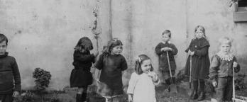 Black and white photo of kindergarten children