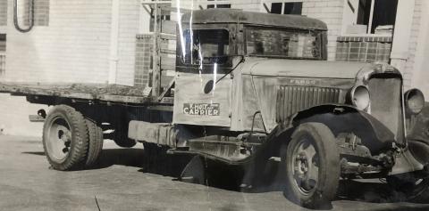 black and white photo of a truck