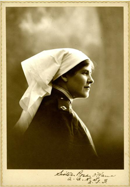 a portrait of a woman in uniform