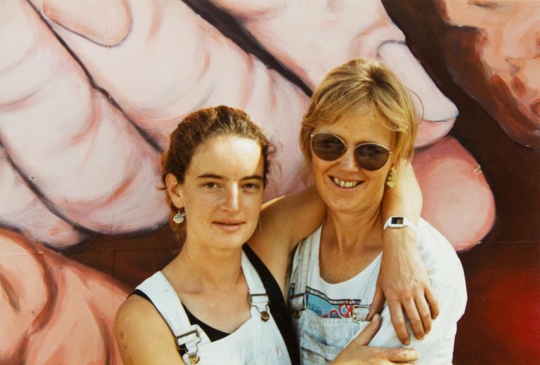 Megan Evans and Eve Glenn in front of the Women's Mural