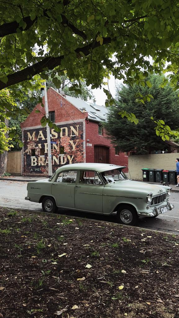 Recent photo of the ghost sign Maison Brandy Penfolds on Canning Street North Melbourne